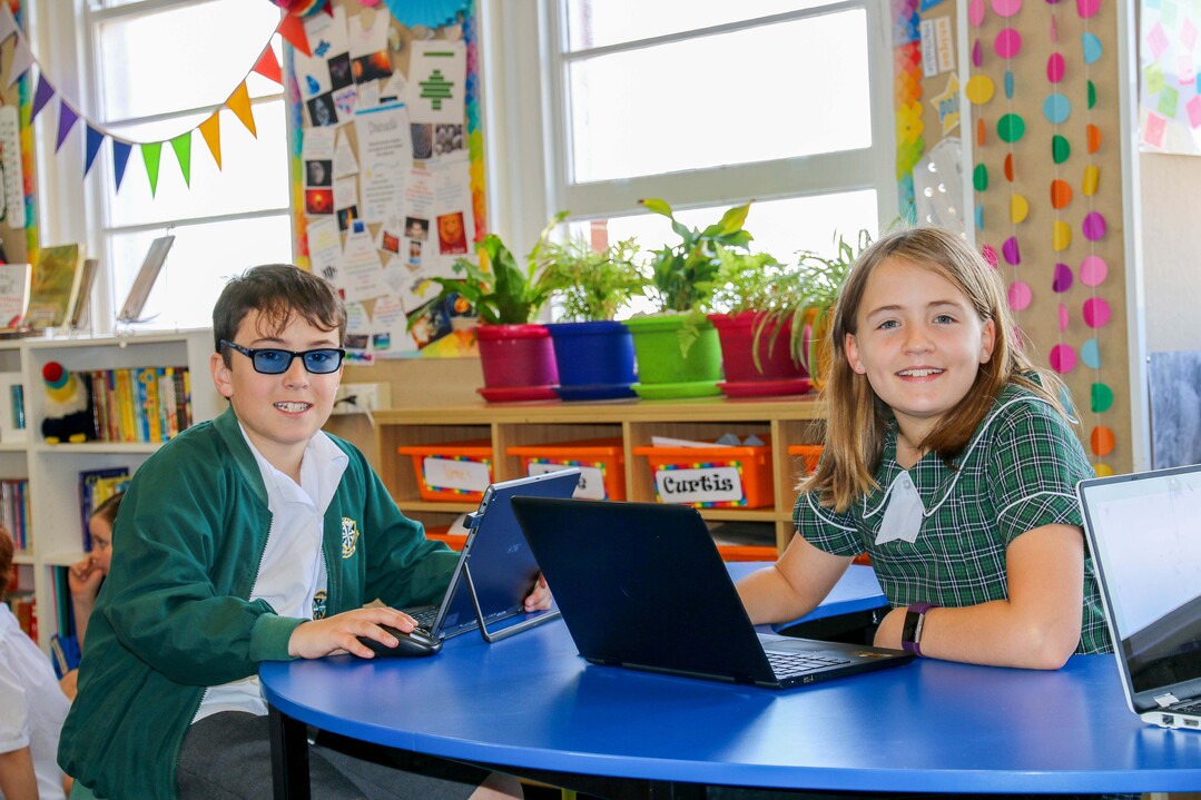students using laptops
