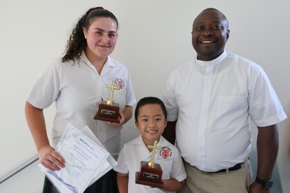 Catherine_McAuley_Award_winners_Montana_Dean_and_Alexander_Torio_with_Father_George_Small_.JPG