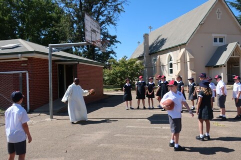 father_george_and_basketball_3_Small_.JPG