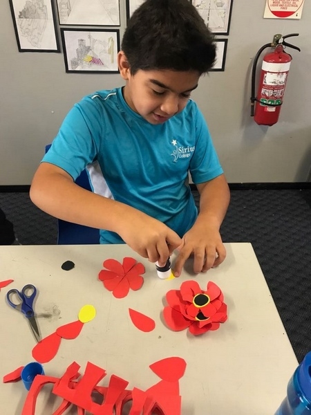 Students making Poppies for ANZAC Day