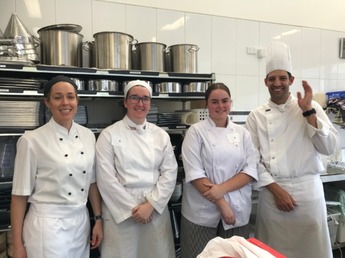Worldskills_comp_Abby_and_Maddisson_with_the_judges.JPG
