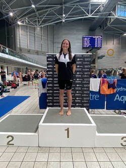 NSW Country 14 years 100m backstroke champion - Isla Martin