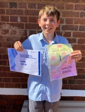 Sam_Koop_with_his_poster_and_certificate.jpg