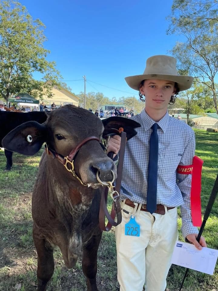 Chase Rosten and the steer he has prepared