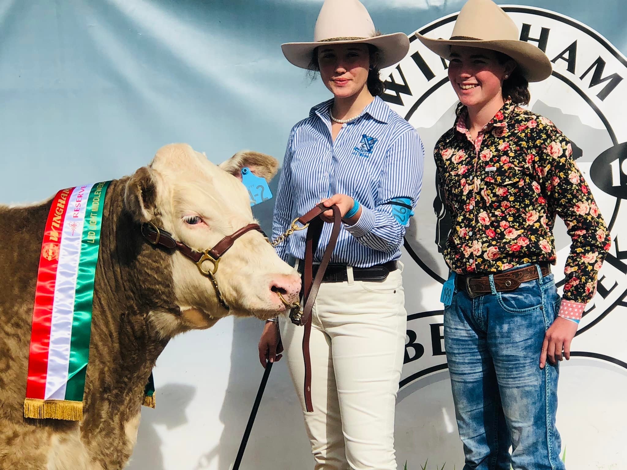 Isabel DeJager Harriet Shields and their Champion Led Steer on the hoof