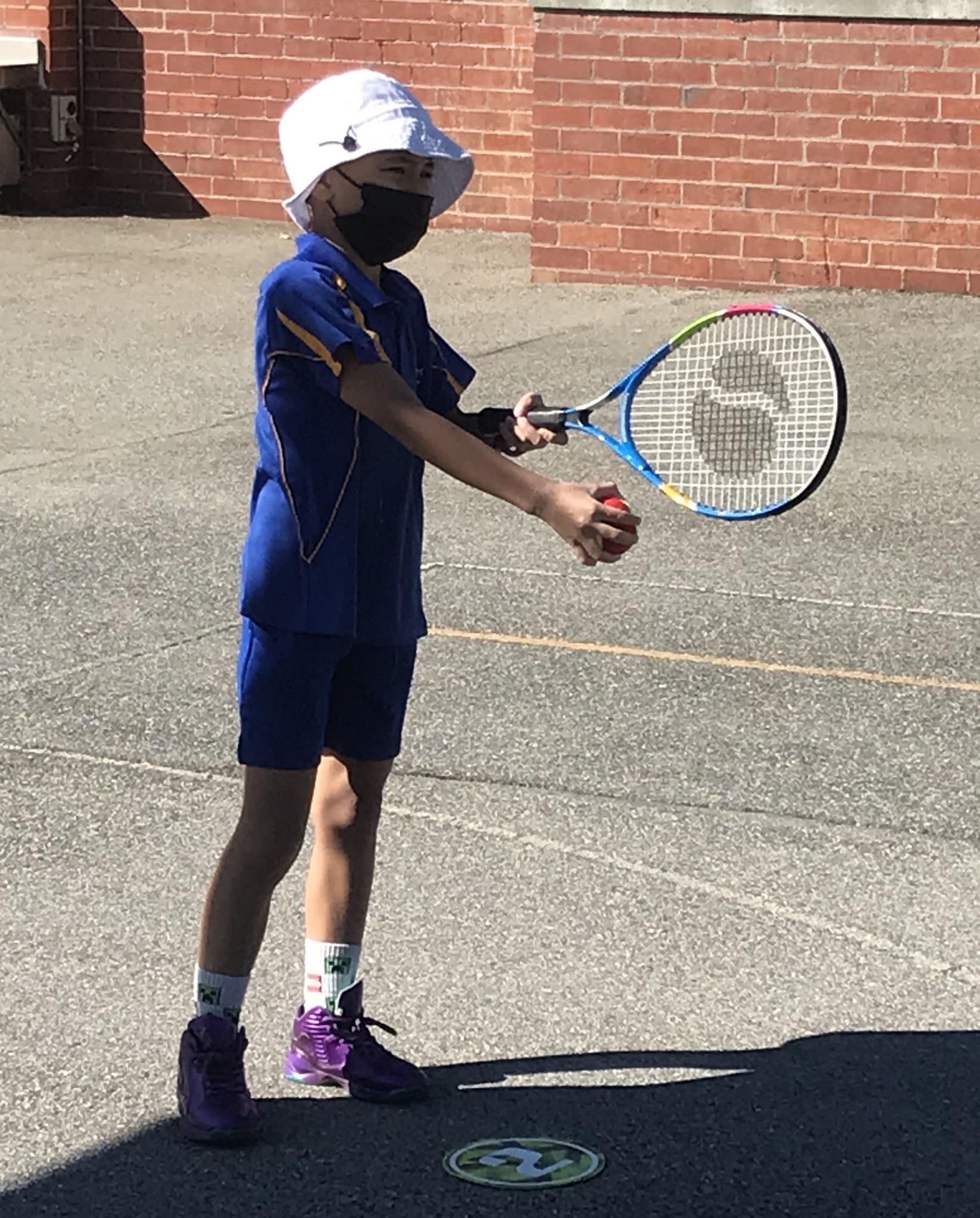 Liam plays tennis